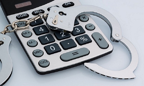 calculator and handcuffs.jpg